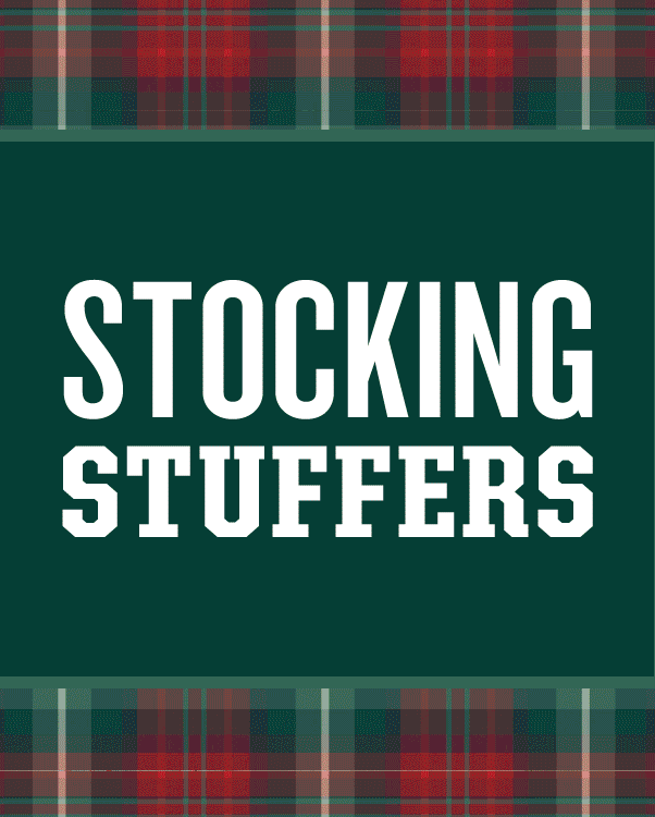 a duluth fire hose christmas stocking surrounded by lump of coal soap, buck naked underwear, drinkwear, and other goodies